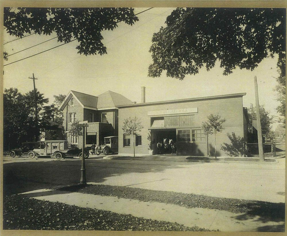 Old black and white photo of exterior of building